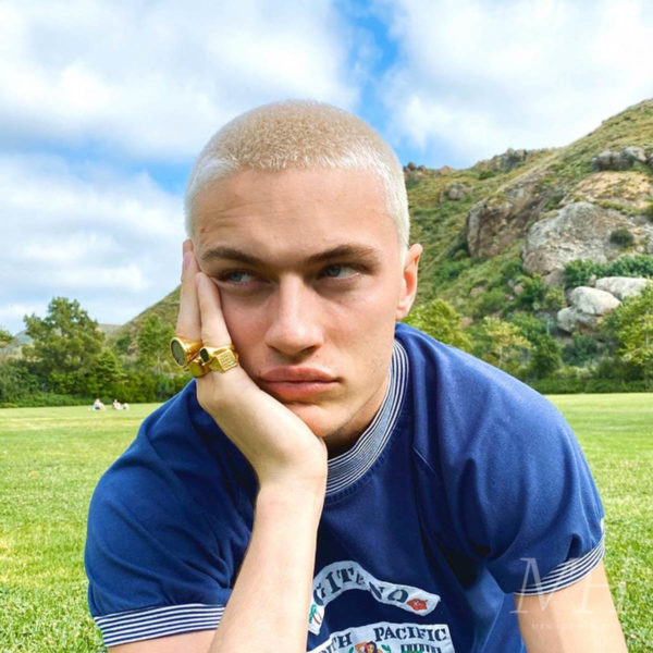 Portrait of a chinese man with a buzz cut hairstyle on Craiyon