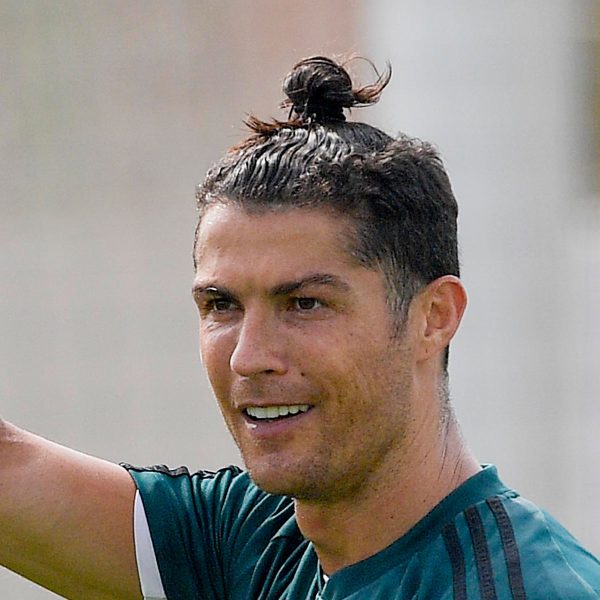 cristiano grown out hairstyle in man bun
