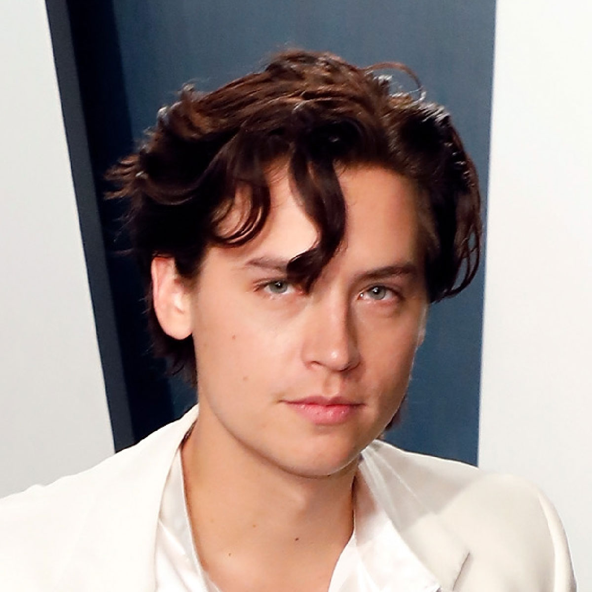 cole-sprouse-grown-out-side-parted-hairstyle