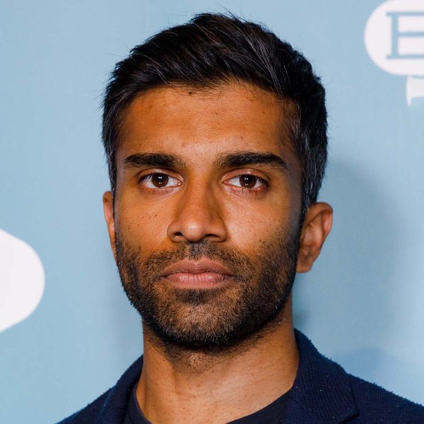 https://manforhimself.com/wp-content/uploads/2022/02/nikesh-patel-short-hair-with-brushed-back-layers-mens-hairstyles-man-for-himself-1-1-600x600.jpg