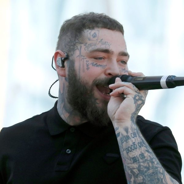 Post Malone: Caesar Cut With High Fade And Skull Tattoos
