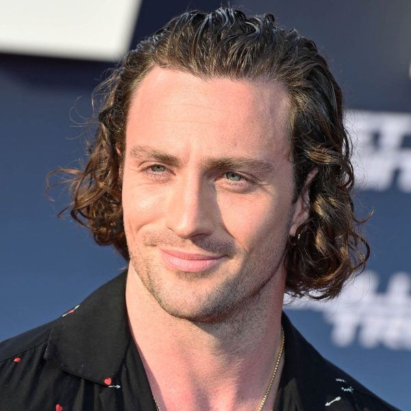 Aaron Taylor-Johnson: Long, Curly, Swept Back Hairstyle