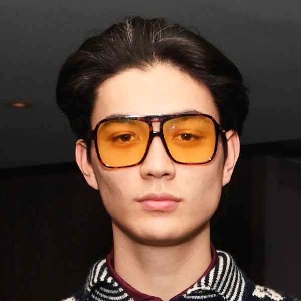 William Gao: Brushed Back 90s Inspired Hairstyle